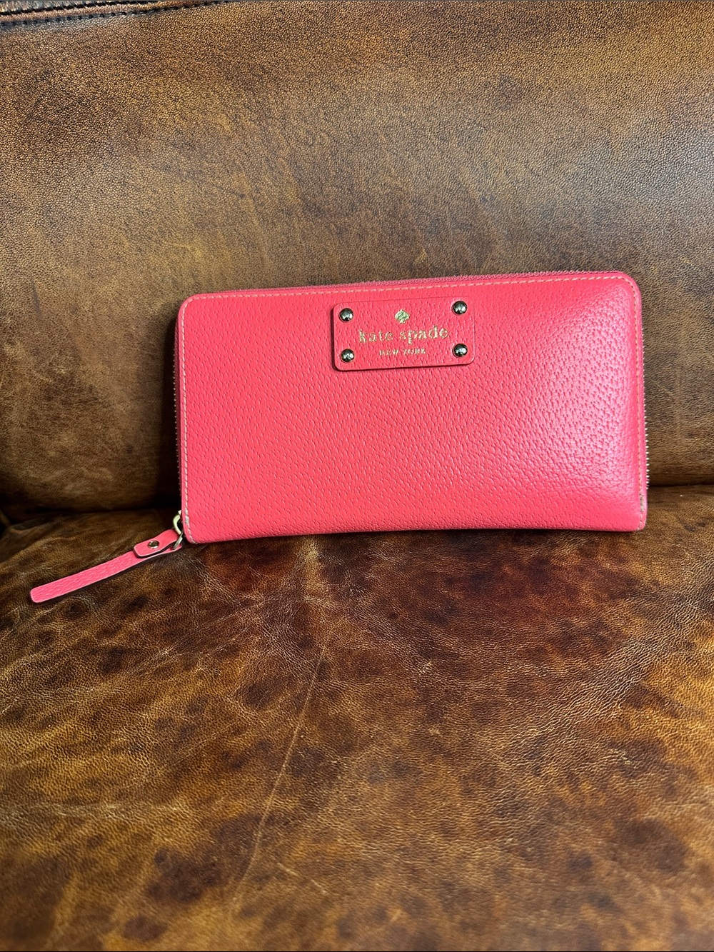 kate spade Coral Pink Zip-Around Pebbled Leather Wallet